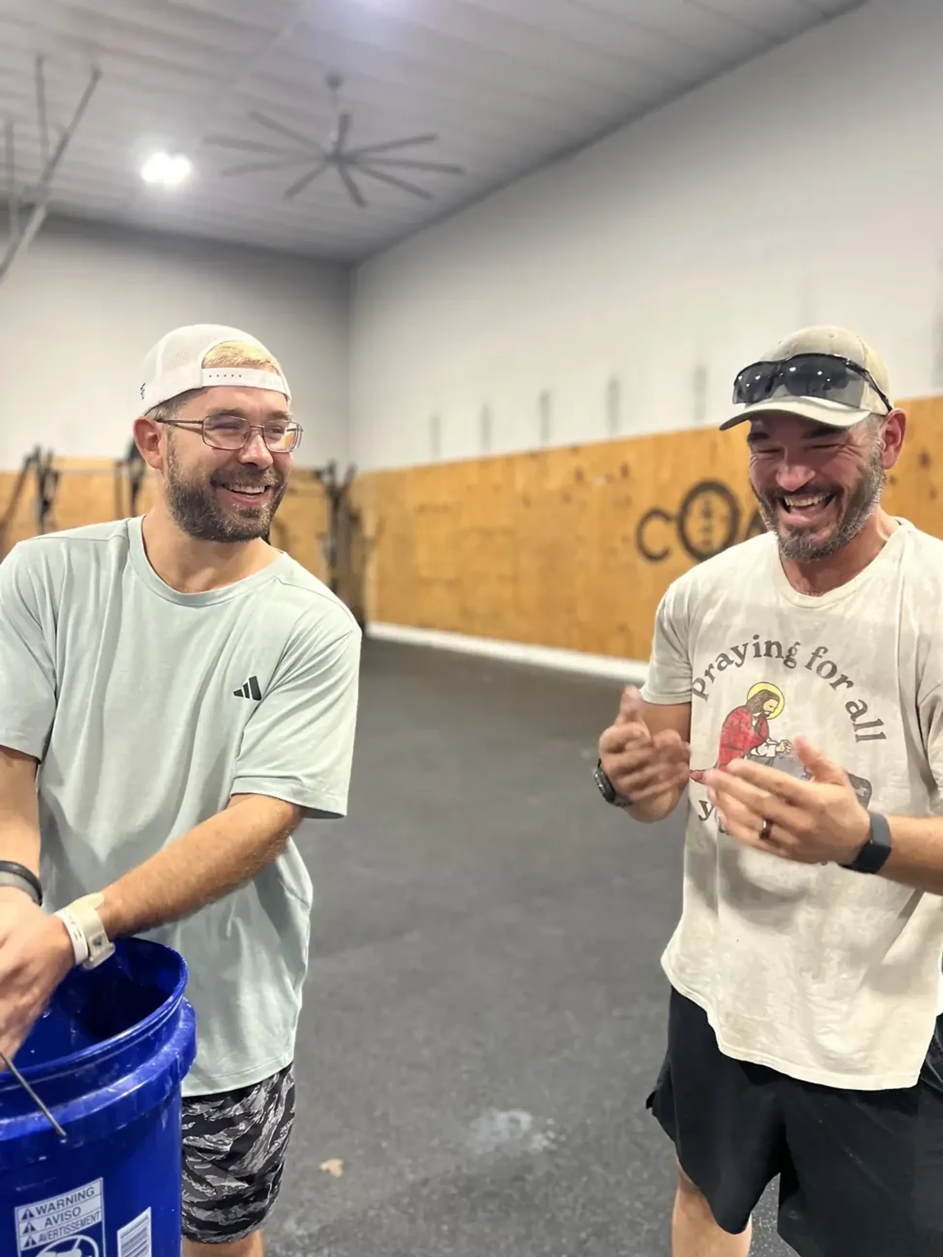 Crystal Coast CrossFit members smiling together at the gym
